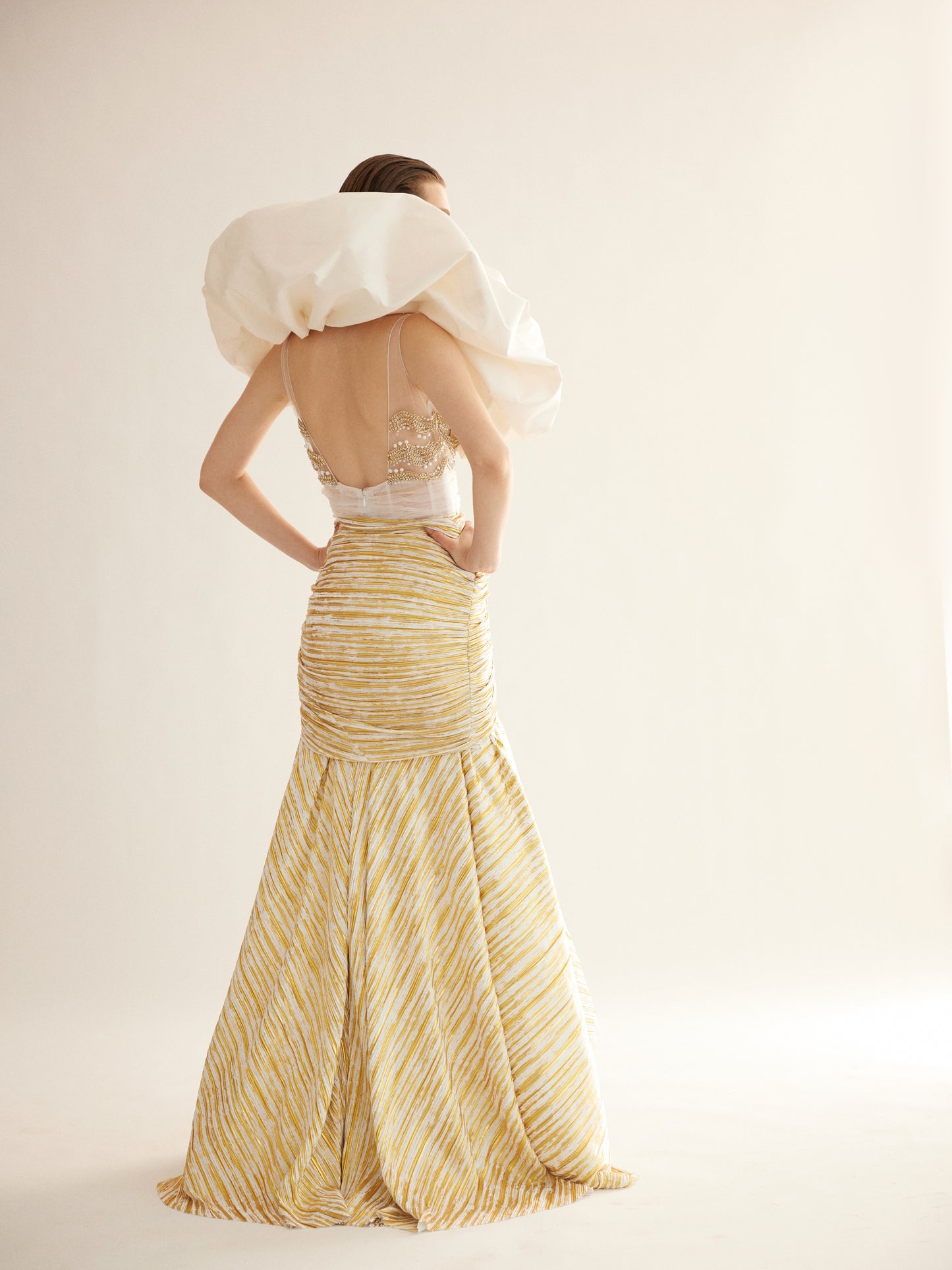 White and Gold High-Low Gown with Embroidered Bodice and Draped Shoulders