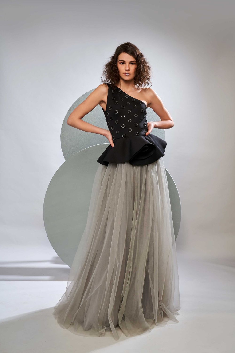 One Shoulder Peplum Gown With Tulle Skirt