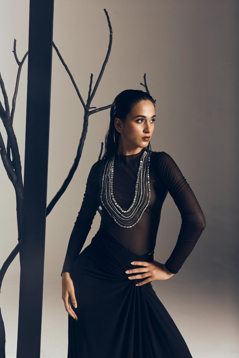 BODYSUIT WITH A LONG DRAPE SKIRT